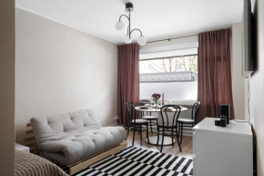 Trendy Nordic Studio by Tram Stop